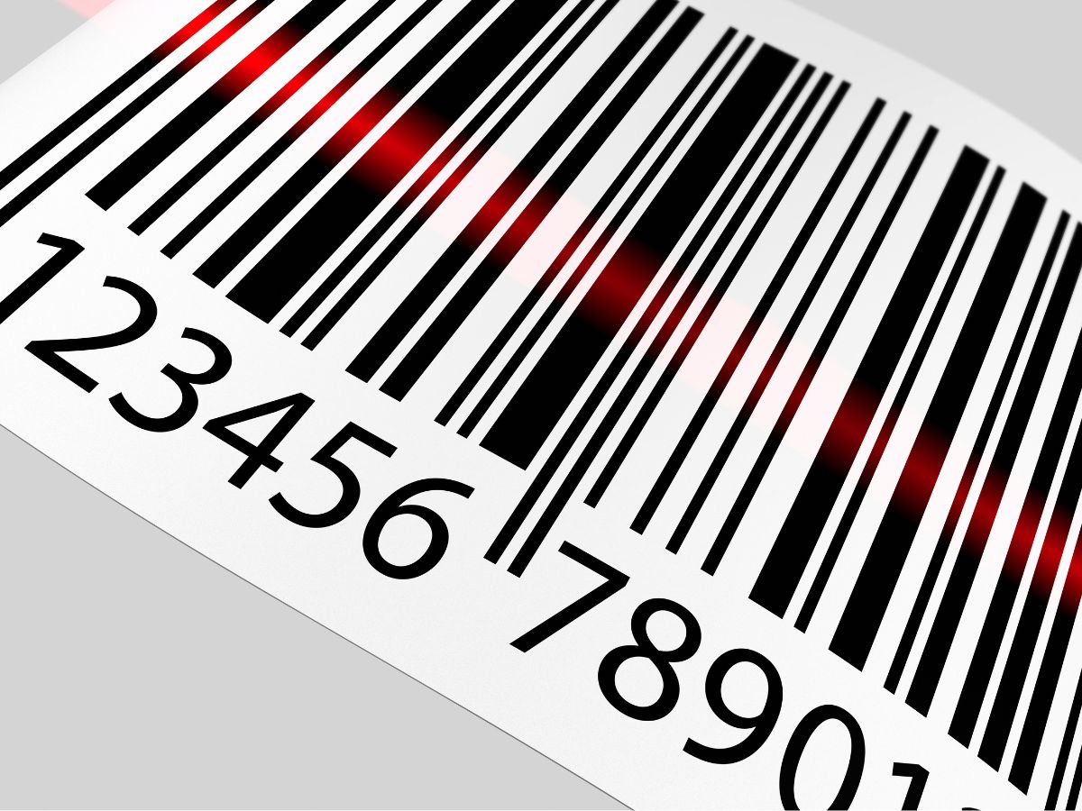fekete-fehér vonalkódón keresztbe piros fénycsík
