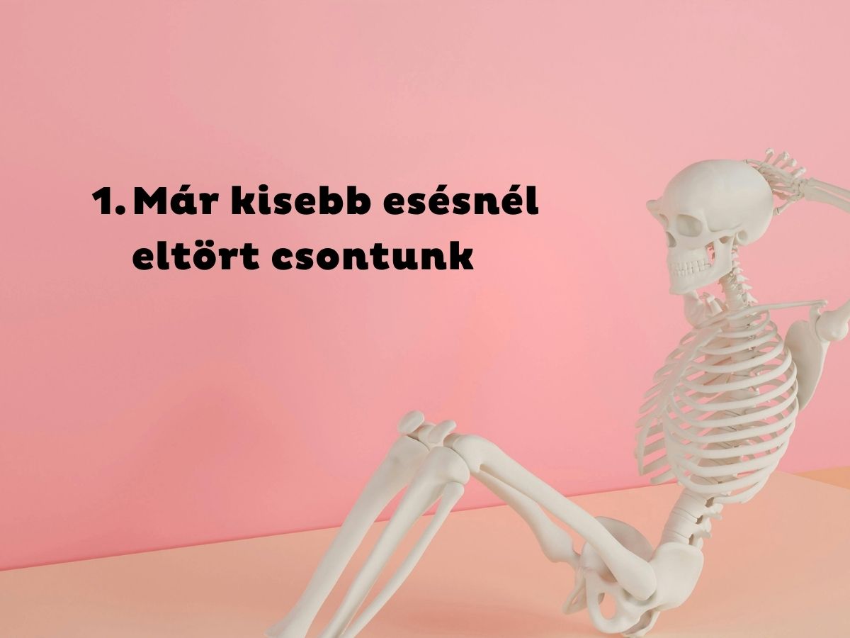 Rózsaszín háttér, fehér csontváz a jobb sarokban