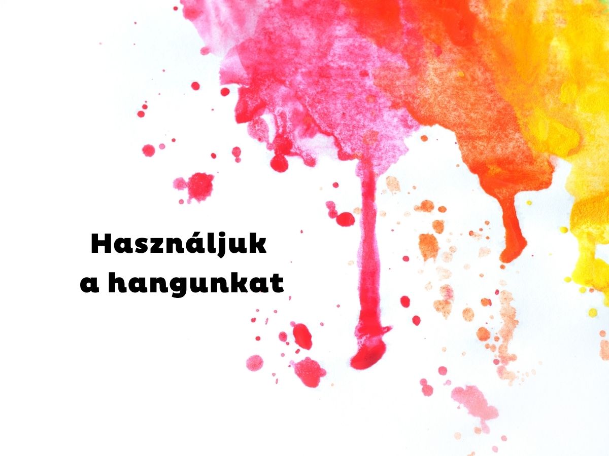 Rózsaszín, piros, sárga festékfolyás a kép jobb felső sarkában, fehér háttéren