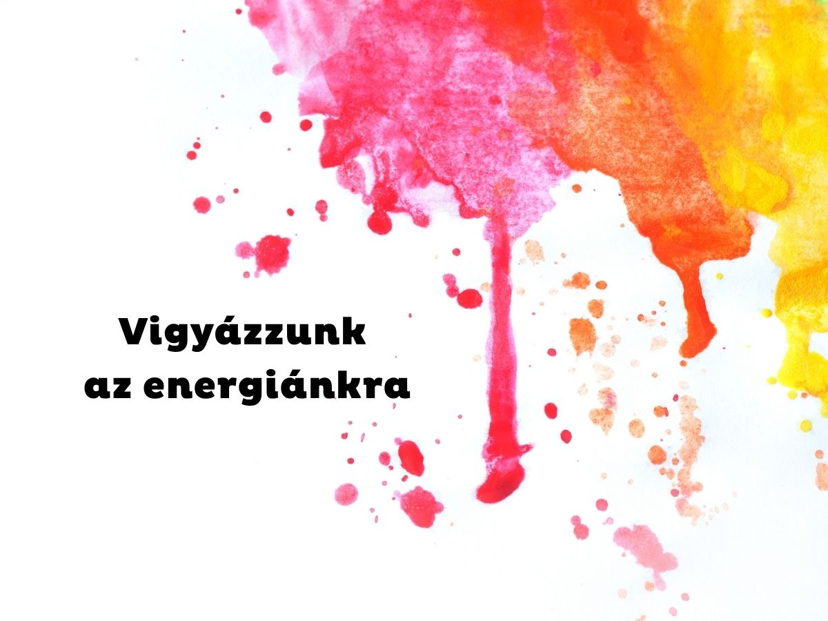Rózsaszín, piros, sárga festékfolyás a kép jobb felső sarkában, fehér háttéren