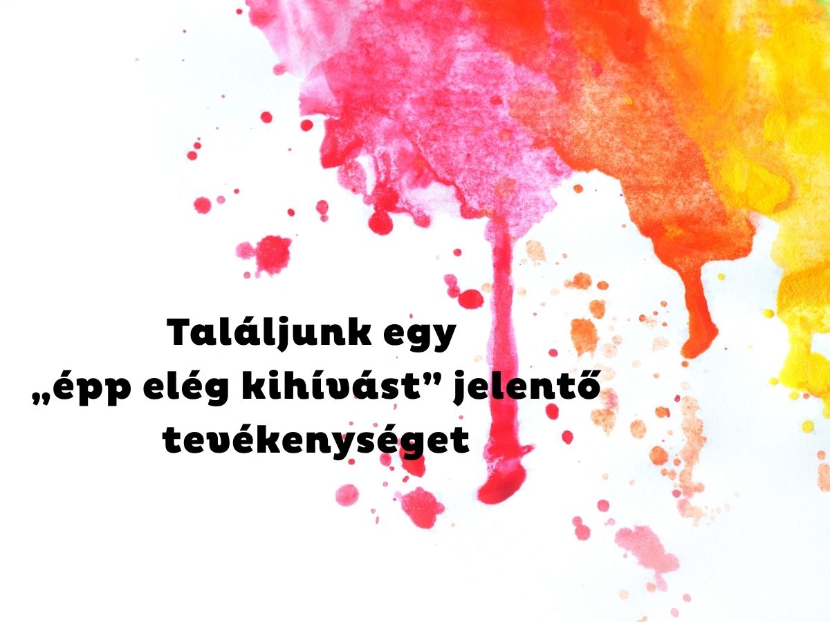Rózsaszín, piros, sárga festékfolyás a kép jobb felső sarkában, fehér háttéren