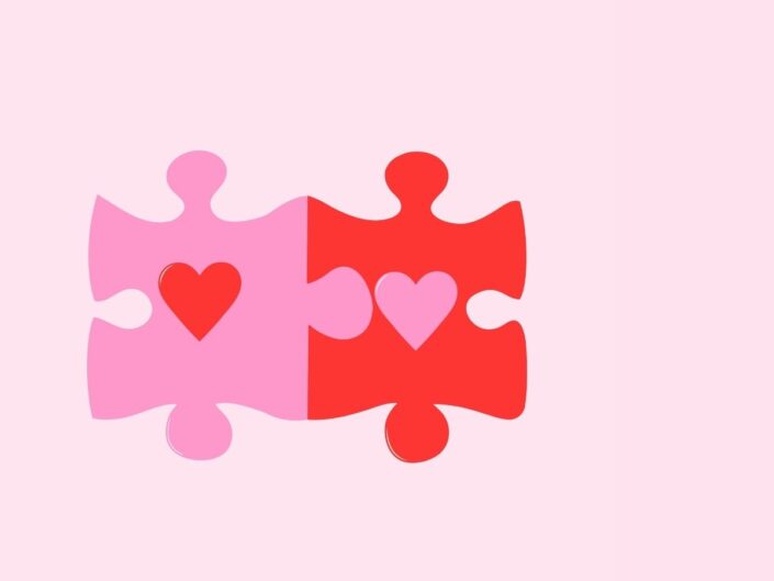 Grafika tökéletes párkapcsolathoz: két illeszkedő puzzledarab, egyik piros, másik rózsaszín, mindkettő közepén az ellentétes színből szív